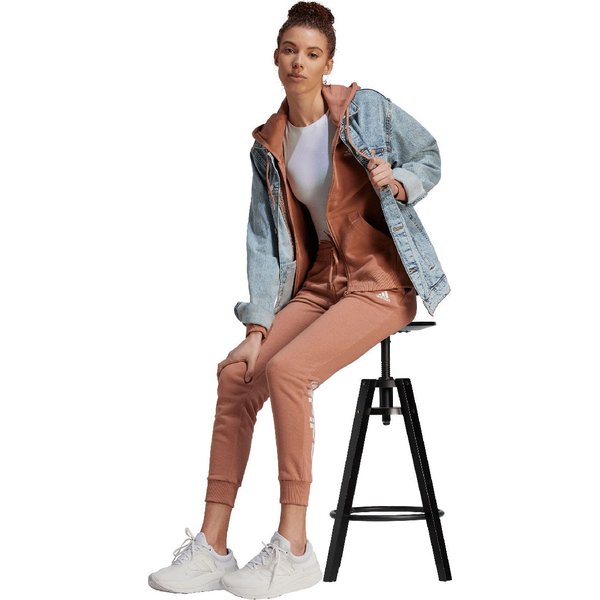 Spodnie dresowe damskie Essentials Linear French Terry Cuffed Adidas - brązowe