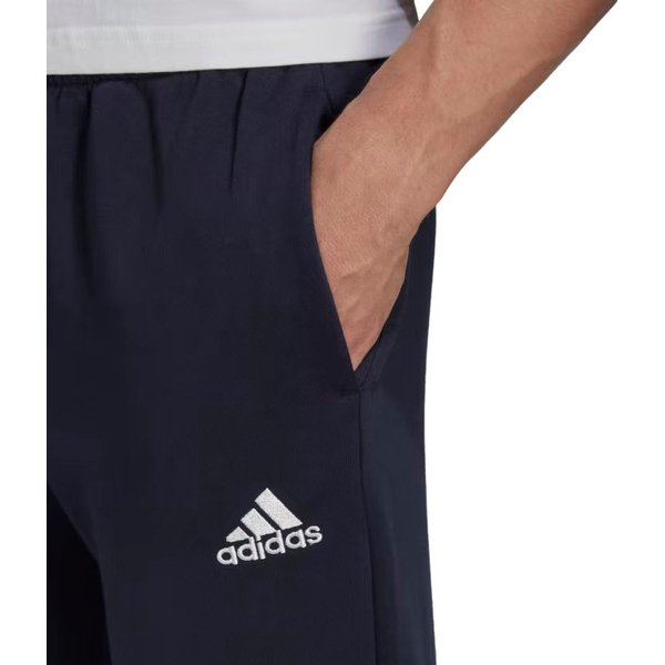 Spodnie dresowe męskie Essentials Fleece Regular Tapered Adidas - granatowe