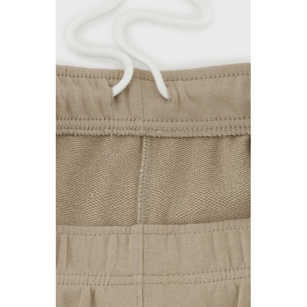 Spodnie dresowe męskie Minimal C Logo Joggers Legacy Champion - beżowe