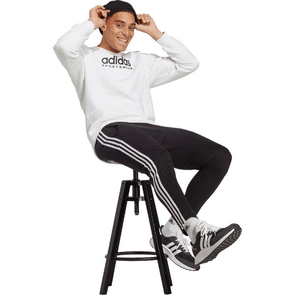 Spodnie dresowe męskie Essentials Stingle Jersey Tapered Open Hem 3-Stripse Adidas - czarne