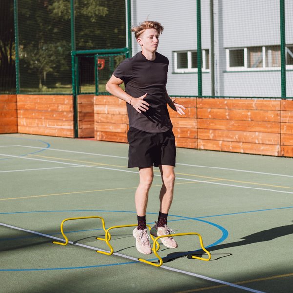 Płotek treningowy 23cm Outtec - żółty