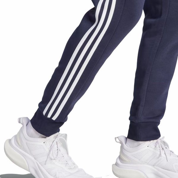 Spodnie dresowe męskie Essentials Fleece 3-Stripes Tapered Cuff Adidas - granatowe