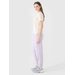Spodnie dresowe damskie TTROF1013 4F - jasny fiolet