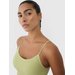 Biustonosz sportowy bezszwowy damski USBAF151 4F - jasna zieleń