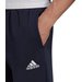 Spodnie dresowe męskie Essentials Fleece Regular Tapered Adidas - granatowe