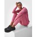Spodnie dresowe damskie TFTRF689 4F - ciemny róż