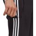 Spodnie dresowe męskie Essentials Stingle Jersey Tapered Open Hem 3-Stripse Adidas - czarne