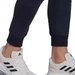 Spodnie dresowe męskie Essentials Fleece Regular Tapered Adidas - granatowe