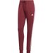 Spodnie damskie Essentials 3-Stripes French Terry Cuffed Adidas - czerwony