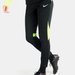 Spodnie dresowe damskie Dri-Fit Academy Pro Nike - czarne/zielone
