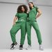 Spodnie dresowe damskie ESS+ Script Puma - Archive Green