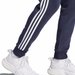 Spodnie dresowe męskie Essentials Fleece 3-Stripes Tapered Cuff Adidas - granatowe